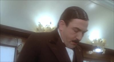 The obvious implication is that the murderer - Murder on the Orient Express
