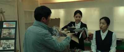 The one with fat head and weird hair. - Confidential Assignment