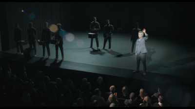 The ones up top
are waving and laughing - David Byrne's American Utopia