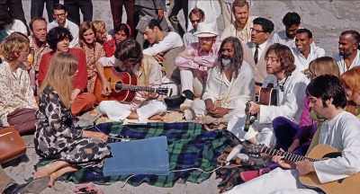 The only way we can change the system
is by changing it non-violently, - The Beatles and India
