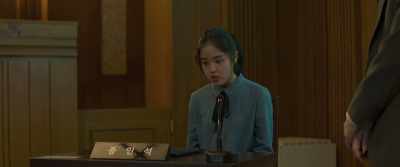 The outer corners of her eyes are drooping, - Innocent Witness
