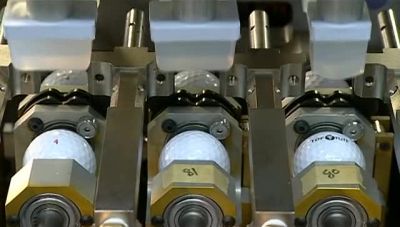 THE PADS BRAND EACH BALL
WITH A PLAYER NUMBER, - How It's Made