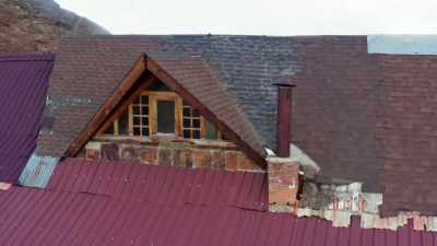 The paint work has degraded,
roof panels are missing, - Mysteries of the Abandoned