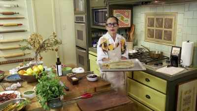 The parchment paper is on fire inside the oven. - Selena + Chef