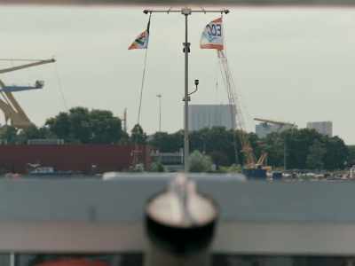The passengers responded
by waving a Dutch flag. - Occupied City