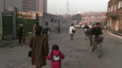 ♪ The pathetic Americans
kneel on the ground ♪ - Inside North Korea: Then and Now with Lisa Ling