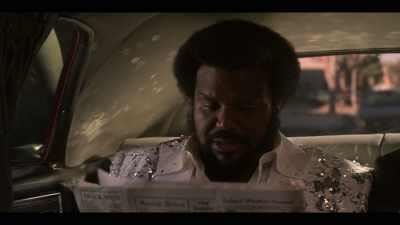 The plot is vague,
and the actors scream their lines. - Dolemite Is My Name