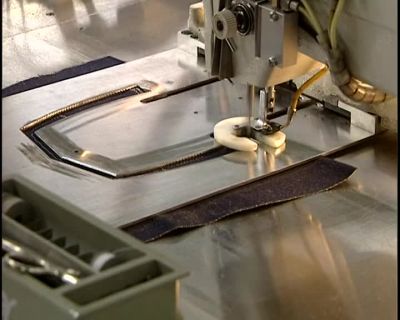 THE POCKET IS NOW
SEWN INTO PLACE. - How It's Made