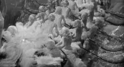The production number always seemed to start
with a duet between Ruby Keeler and Dick Powell. - The Love Goddesses