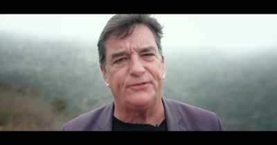 ... that the quantum world while being
 certainly more than merely a description... - The End of Quantum Reality