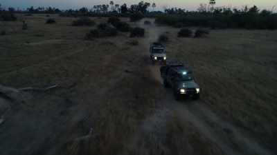 The rear guard
finally make it into camp, - In the Footsteps of Elephant