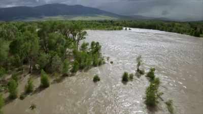 The river spilled
over their banks - Yellowstone: One-Fifty