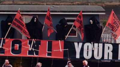The rotten financial system,
and it's run on debt, - Wake Up Punk