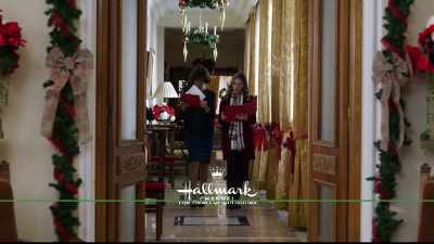 The seamstress
is working on costumes, - Christmas at the Palace
