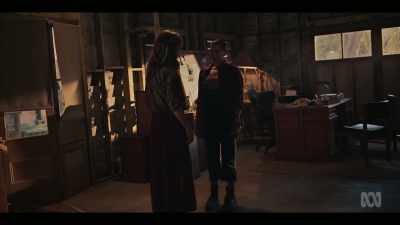 The shaved head and the tattoos
and this vampire's den, - Troppo