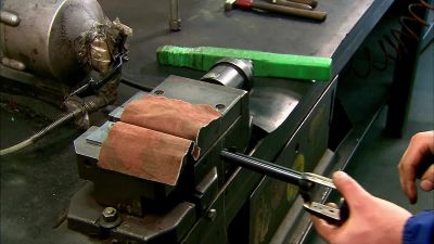 THE TECHNICIAN AIMS
THE ASSEMBLED GUN - How It's Made