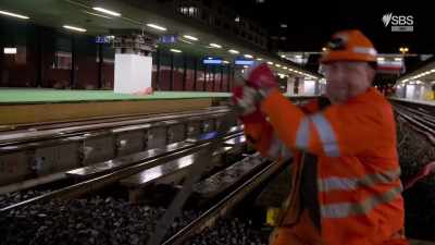 The tracks are levered
to the correct height by hand. - World's Busiest Train Stations