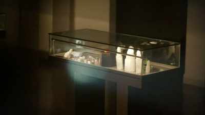 The two men huddle
motionless in the corner - History's Greatest Heists with Pierce Brosnan