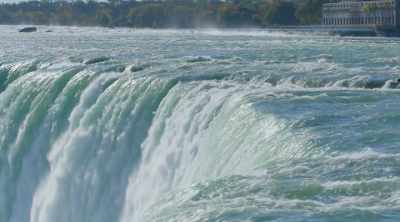...the water restlessly rushes us
towards its famous midpoint. - World's Most Scenic River Journeys