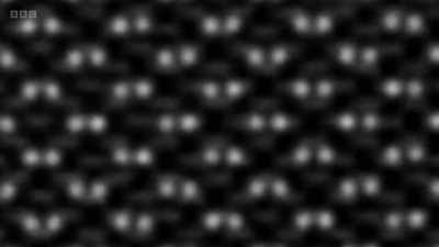 The white blurs resolve
into two clear dots, - Secrets of Size: Atoms to Supergalaxies