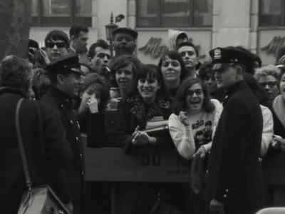 The whole place is surrounded by girls - Beatles '64