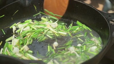 The wild onions
have been sautéed just enough - Searching for Soul Food