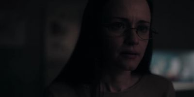 The woman at the library. - The Handmaid's Tale