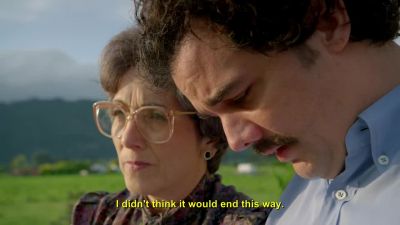 The woman outside. - Narcos