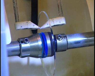 ...THEN CUTS THE LENSES
TO THAT SHAPE. - How It's Made