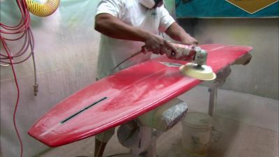 THEN HE GIVES THE BOARD
AN OVERALL SANDING - How It's Made