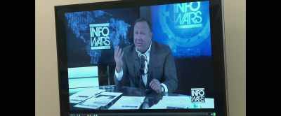 Then we see footage - The Truth vs. Alex Jones