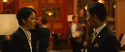 Then separately, there's one woman checking in too. - Masquerade Hotel