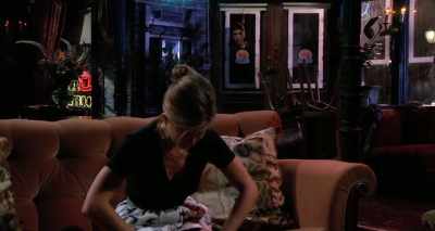 Then she stops, leans on a table and drops her head. - Friends: The Reunion