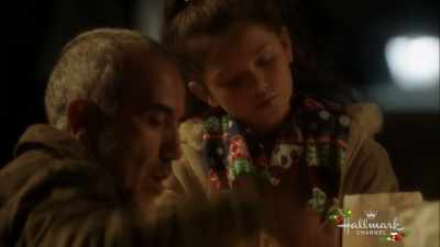 Then we take a candle like so.
We have luminarias. - Enchanted Christmas