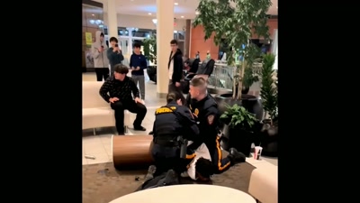 Then the cop put his hands
behind his back, cuffed him... - Sound of the Police