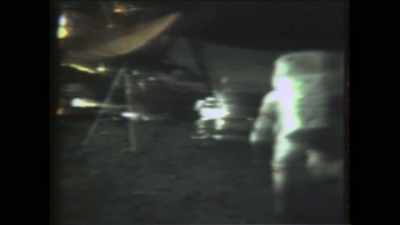 Then the first astronaut
also returns to the LEM. - American Moon