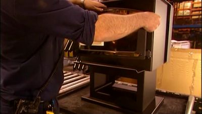 THEN THEY PUT THE DOOR BACK ON
AND LOCK IT SHUT. - How It's Made
