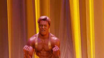 Then you throw him off
like some old overcoat for Rocky. - The Rocky Horror Picture Show: Let's Do the Time Warp Again