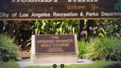 There is a sign that says,
"The Armand Hammer Golf Course." - House of Hammer
