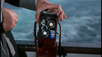 There are 24 symbols 16 code keysIt is inserted in a slot and the message comes out in a paper rollfrom another slot on the other side The mechanism isOh James James will you make love to me all the time in EnglandDay and night Go on about the mechanism - From Russia with Love