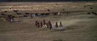 There are some men riding in.
We could use some short help, - Big Jake