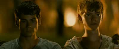 Hell of a first day GreenieHerePut some hair on your chestMy God What is thatI don't even knowIt's Gally's recipeIt's a trade secretYeah well he's still an assholeHe saved your life todayTrust me The maze is a dangerous placeWe're trapped here aren't - The Maze Runner