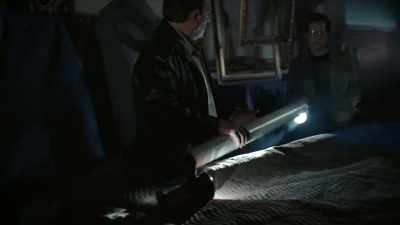 There, he's walked in
and shown by flashlight - History's Greatest Heists with Pierce Brosnan