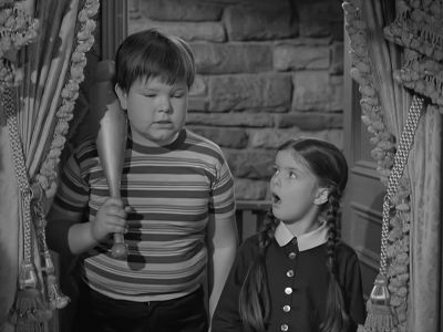 There he is. In the chair. - The Addams Family