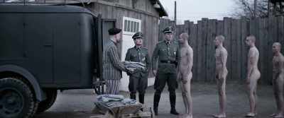 There is no need for uniforms.
Get in. Get in! - The Photographer of Mauthausen