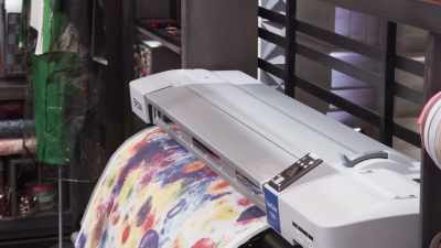 There on the right is a digital printer,
so feel free to go crazy with that. - Next in Fashion