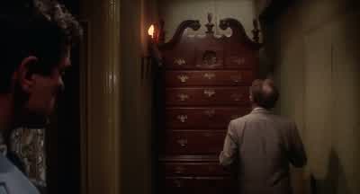There's a closet behind that secretary. - Rosemary's Baby