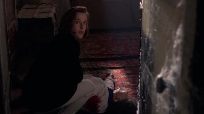 There's a gunshot wound to her heart. - The X-Files
