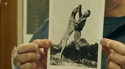 There's a person having fun with a large dog. - Ex Libris: The New York Public Library