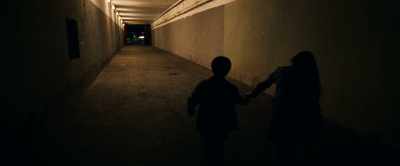 - There's an exit, we're saved!
- Thank God. - Dark Glasses